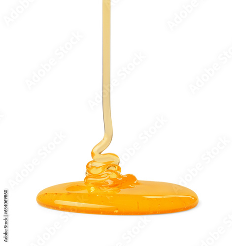 Pouring tasty natural honey isolated on white