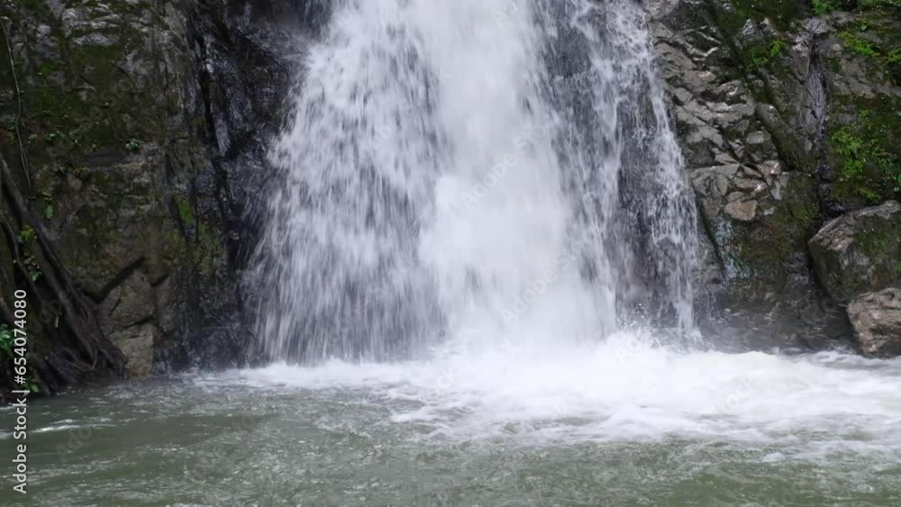 Pan of Bulalacao Waterfalls hidden in the dense jungle of El Nido in Palawan, Philippines, Southeast Asia Pan of Bulalacao Waterfalls hidden in the dense jungle of El Nido in Palawan, Philippines, Southeast Asia