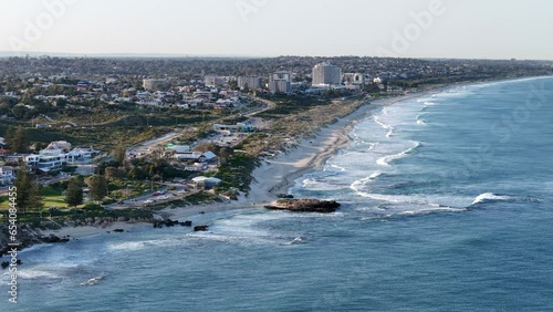 Slow motion drone shot above Scarbrough beach in Perth, Western Australia photo