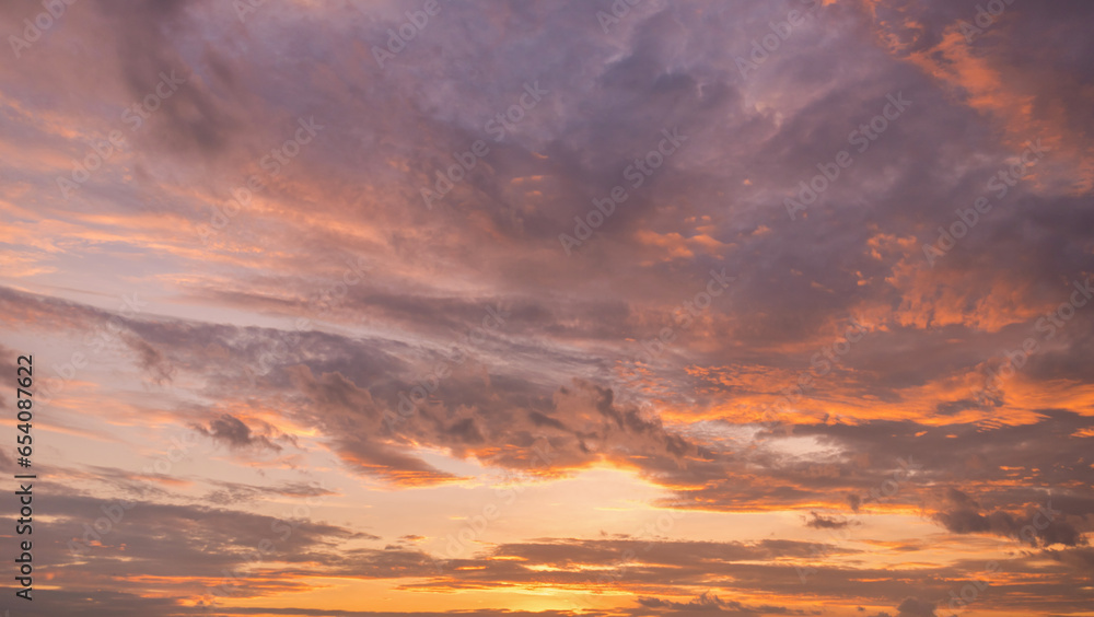 Panoramic view of sunset golden and blue sky nature background.
Colorful dramatic sky with cloud at sunset.Sky background.Sky with clouds at sunset.