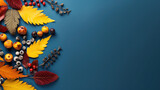Frame of colorful red and yellow autumn leaves with cones and rowan berries on trendy blue background. First day of school, back to school, fall concept