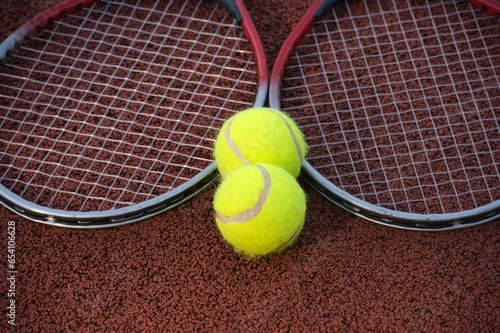 Tennis ball, racquet on hard court surface © NetPix