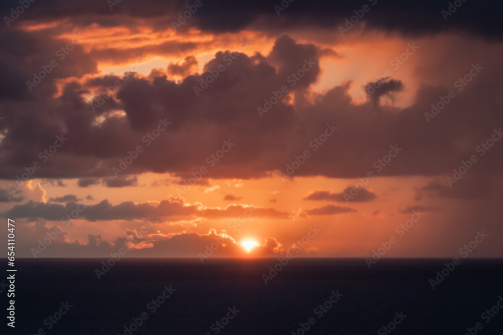 Sunrise, sunset over the horizon of the Caribbean Sea, the Bahamas, and the North Atlantic Ocean
