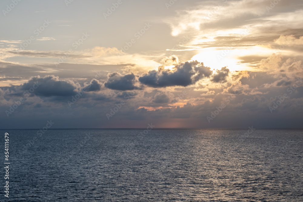 Sunrise, sunset over the horizon of the Caribbean Sea, the Bahamas, and the North Atlantic Ocean