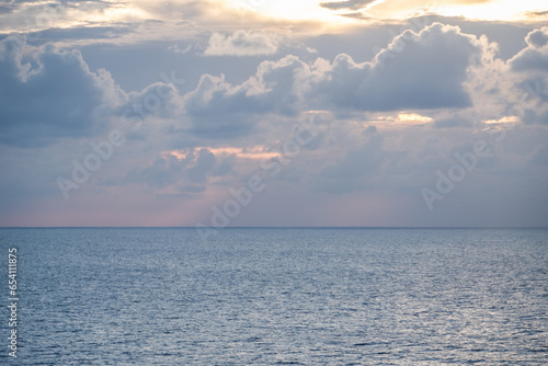 Fototapeta Naklejka Na Ścianę i Meble -  Blue-gray cloudy sky over the Caribbean Sea horizon