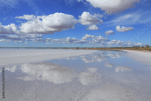 Reflection of clouds in a salt lake. Woomera. South Australia. photo