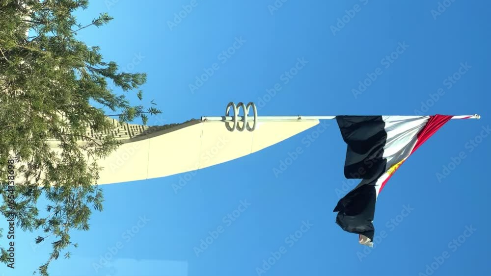 Hurghada, Egypt - December 2022: View of the flag of the country of Egypt. The flag flutters in the wind on the Mediterranean coast. 4K Hurghada, Egypt - December 2022: View of the flag of the country of Egypt. The flag flutters in the wind on the Mediterranean coast. 4K
