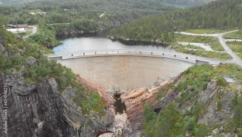 Concrete Wall Of Sarvsfossen Dam In Bykle, Norway. wide aerial photo