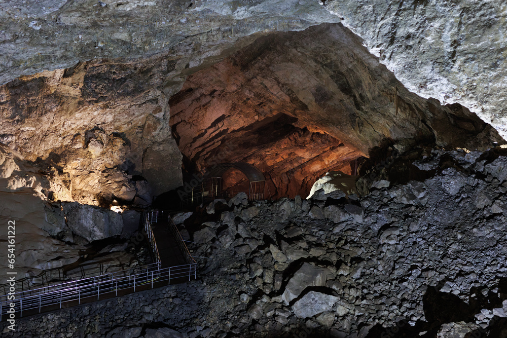 Stalactites, stalagmites from minerals in a mountain cave. Stalactites, stalagmites from minerals in a mountain cave.