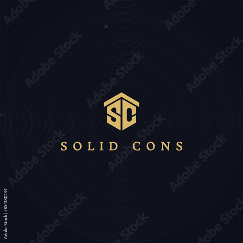 Abstract letter S, C, SC, and CS initial logo design vector graphic idea creative in gold color isolated on a blue Background. Letter SC logo applied for luxury real estate company logo design symbol