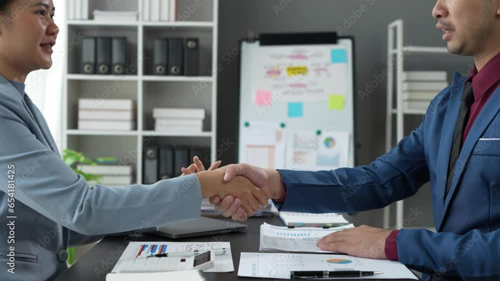 Business people shaking hands after joining a good business dealing in the office. Collaborative teamwork. Business people shaking hands after joining a good business dealing in the office. Collaborative teamwork.