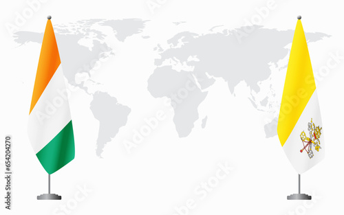 Ivory Coast and Vatican flags for official meeting