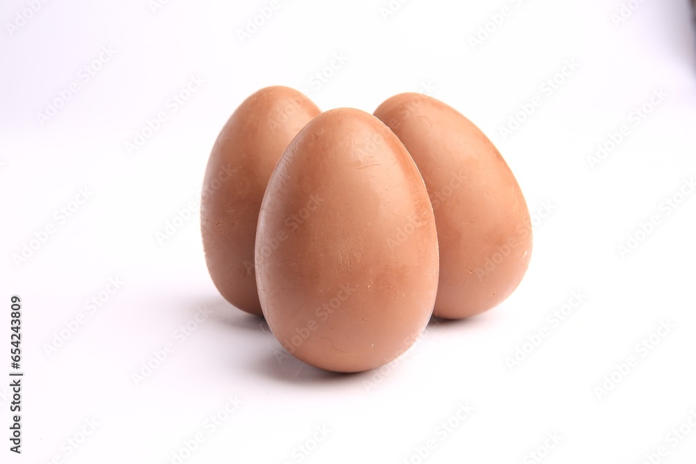 Sveti Vlas, Bulgaria - June 27, 2023: Unwrapped Kinder Surprise Eggs isolated on white Sveti Vlas, Bulgaria - June 27, 2023: Unwrapped Kinder Surprise Eggs isolated on white