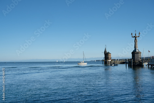 Harbour entrance of Konstanz with lighthouse and the statue of Imperia, Lake Constance (Bodensee). Baden-Wuerttemberg, Germany, Europe