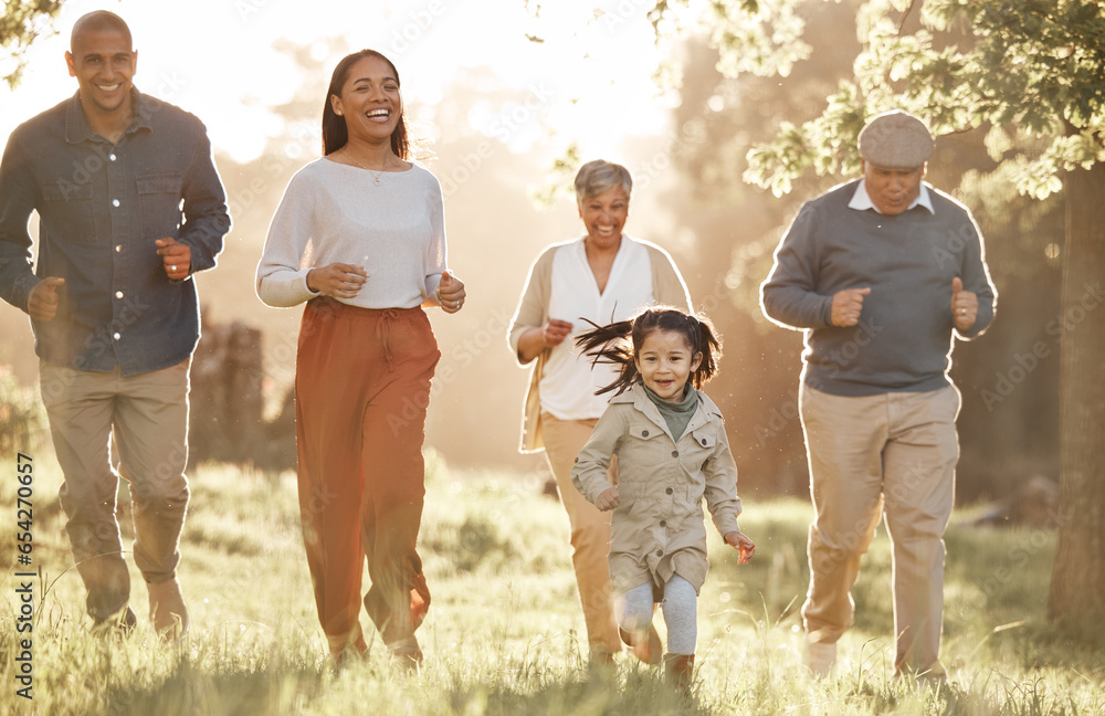 Fototapeta premium Park, running and child with parents or grandparents on grass field for freedom, adventure or playing in summer. Family, men or women with fun or love in forest with sunshine for care or happiness