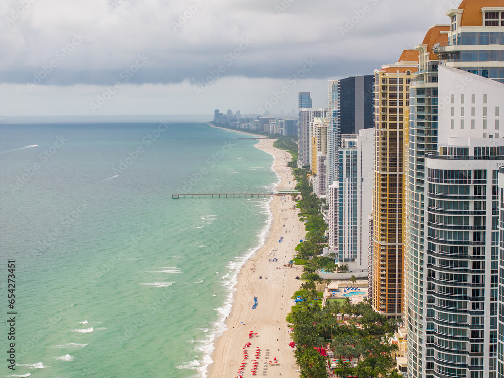 Naklejka premium View down the beach Sunny Isles Miami FL September 2023