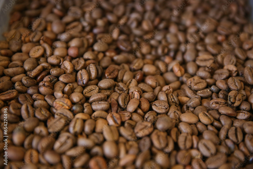 Coffee beans. Coffee beans are spread out on the surface. Coffee beans. Coffee beans are spread out on the surface.