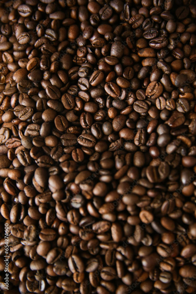 Coffee beans. Coffee beans are spread out on the surface. Coffee beans. Coffee beans are spread out on the surface.