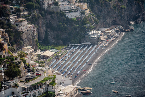 Italian island with medditerranean houses and beach photo