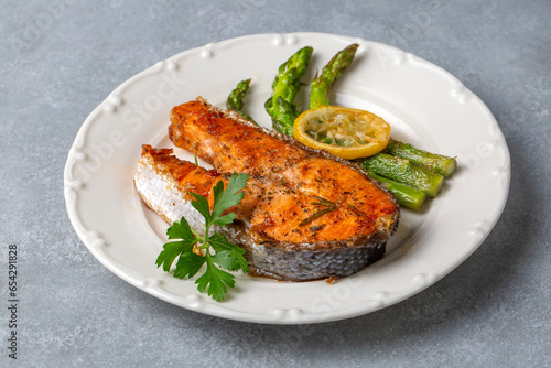 Grilled, baked salmon serve...