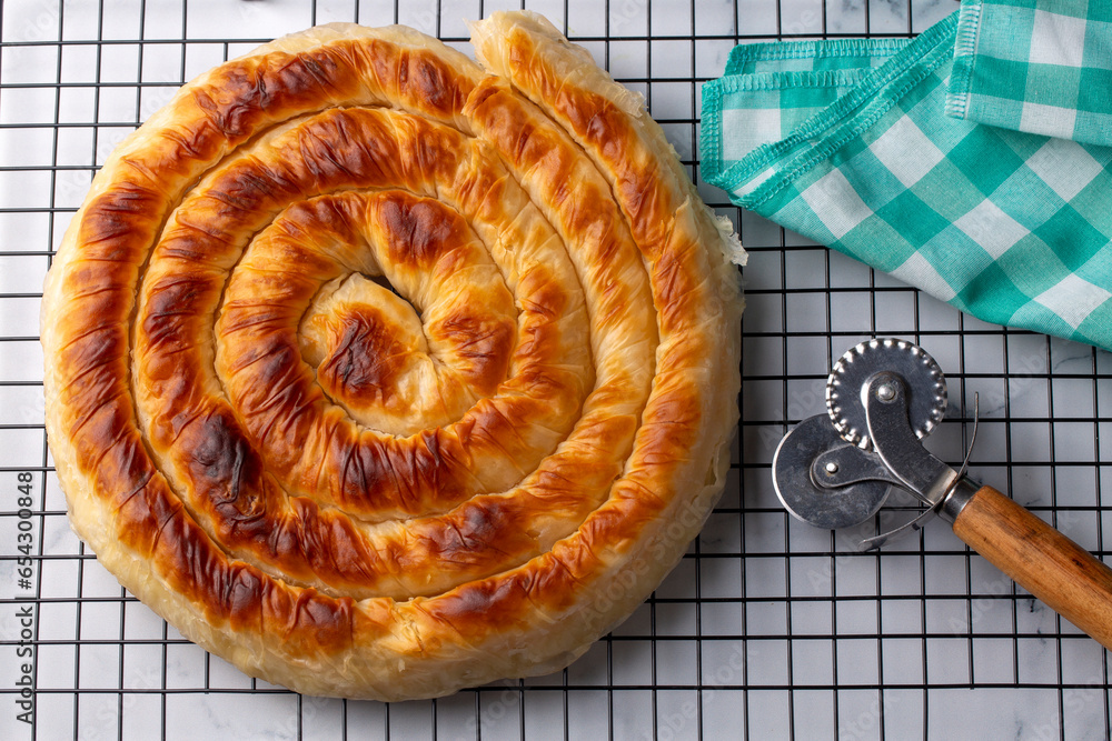 Traditional Turkish pastry with spinach. (Turkish Name Ispanakli Kol