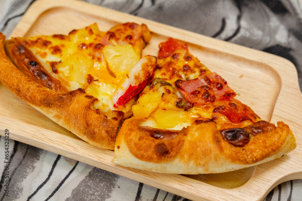 slice of pizza cheese lunch or dinner crust seafood meat topping sauce. delicious tasty fast food in side view. slice of pizza cheese lunch or dinner crust seafood meat topping sauce. delicious tasty fast food in side view.