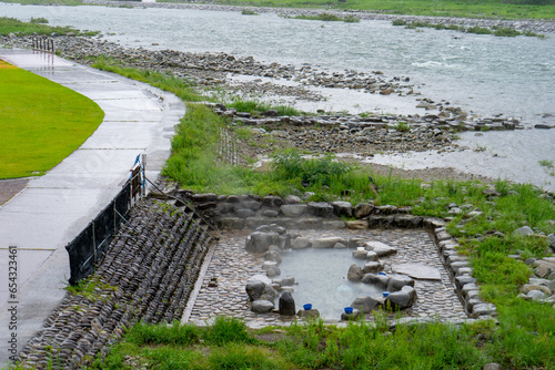 Rotenburo outdoor hot spring at Gero during summer rainy day at Gero Gifu , Japan : 30 August 2019 photo