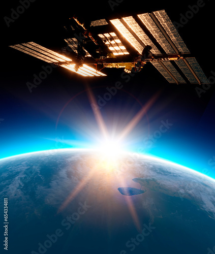 Fototapeta Naklejka Na Ścianę i Meble -  The International Space Station (ISS) is a space station, or a habitable artificial satellite, in low Earth orbit. The station serves as a microgravity and research laboratory, 3d rendering