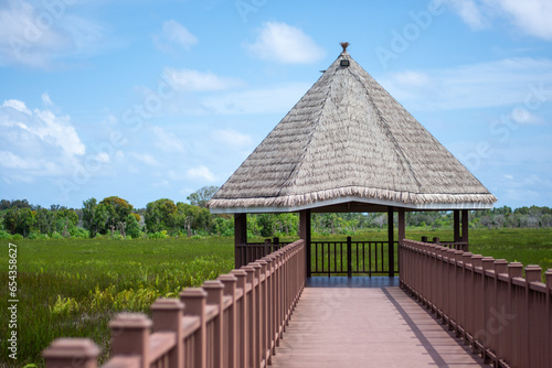 wooden pavilion in the park addu photo