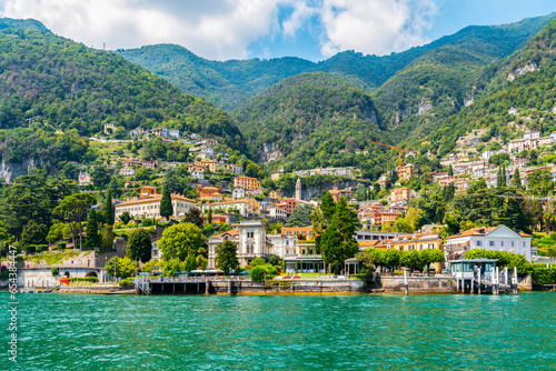 Fototapeta Naklejka Na Ścianę i Meble -  Lake Como, Moltrasio, Italy. View of the shore and buildings.