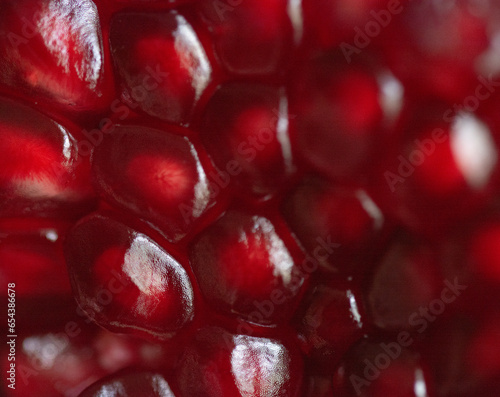red pomegranate seeds, healthy fruit, close up