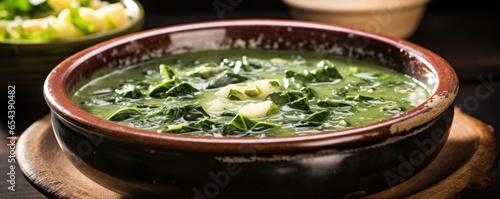 Rich and creamy Jamaican callaloo soup, made with the fresh, leafy, and vibrant callaloo greens, simmered with coconut milk, aromatic herbs, and es. A nourishing and authentic Jamaican delight.