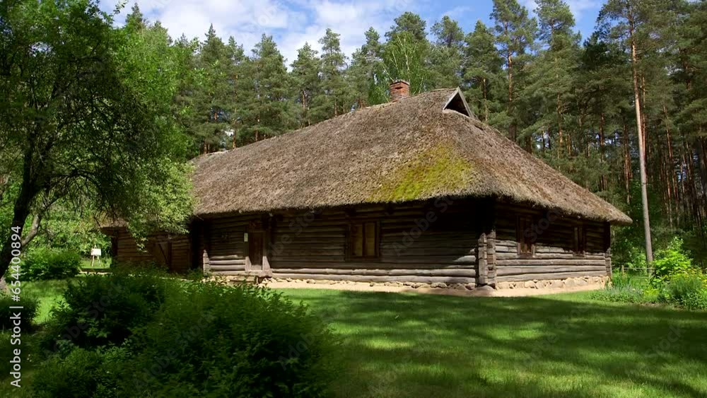 static wide shot of a historic log building static wide shot of a historic log building