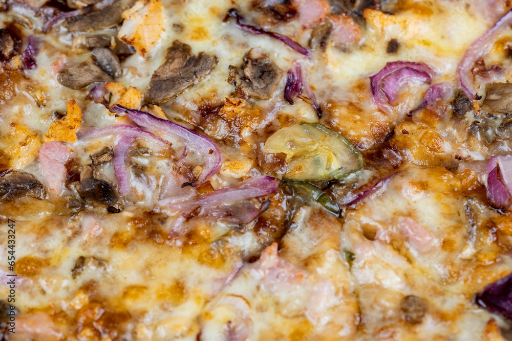 close-up of fresh and hot pizza using many ingredients close-up of fresh and hot pizza using many ingredients