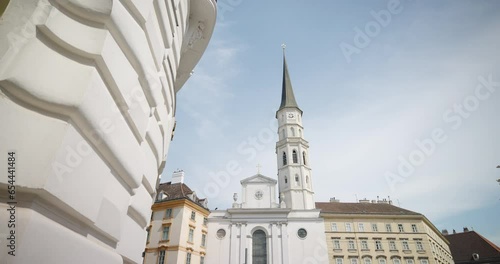 St. Michael's Church and other buildings in Michaelerplatz, Vienna, Austria photo