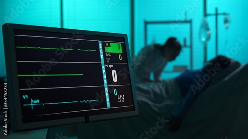 Close-up shot capturing intencive care unit displaying loss of heart and brain activity. Blurred silhouette of a patient dying on the background. Nurse tries to bring him back to life.