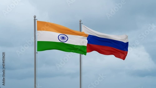 Russian Federation and India flag waving together on cloudy sky, endless seamless loop