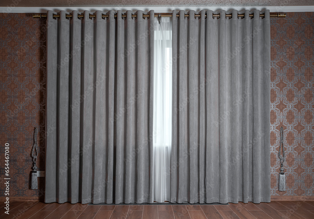 Interior of a room in a house, a large window with curtains and drapes in brown and gray Interior of a room in a house, a large window with curtains and drapes in brown and gray