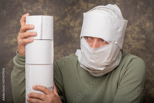 Obraz na plátně mummy made of toilet paper. Thriftiness and greed.