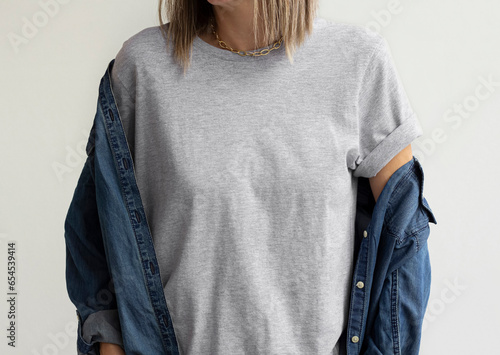 Gray tshirt mockup. Girl grey t shirt template. Woman wearing athletic heather gray t shirt for your design