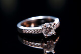 Diamond Ring Isolated on black. Engagement Solitaire Style Ring