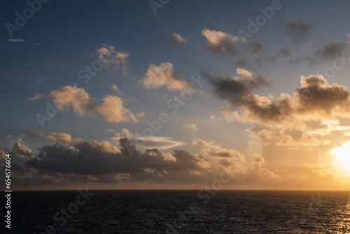 Golden sky over the Caribbean Sea at sunrise sunset