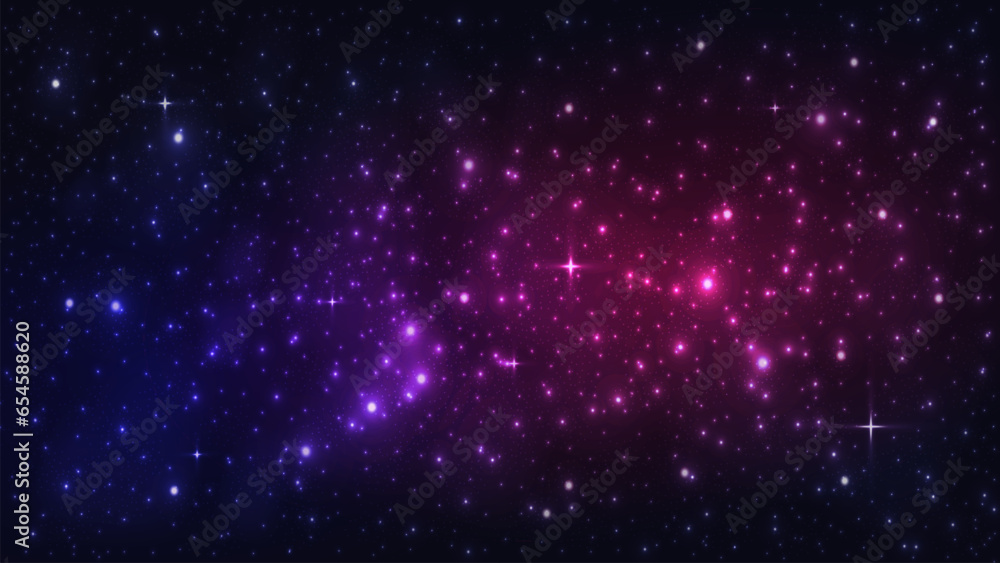 A starry sky with blurred smoke and the milky way on a dark background. Space in blue pink and purple on a dark background.