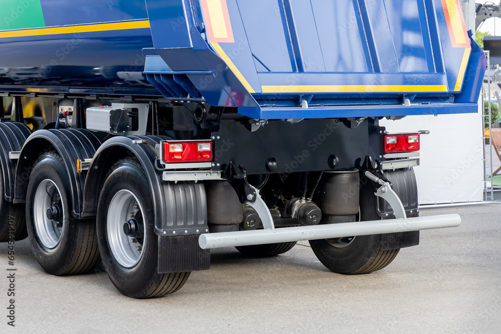 Air suspension system of a new dump semitrailer. Air cylinders on the