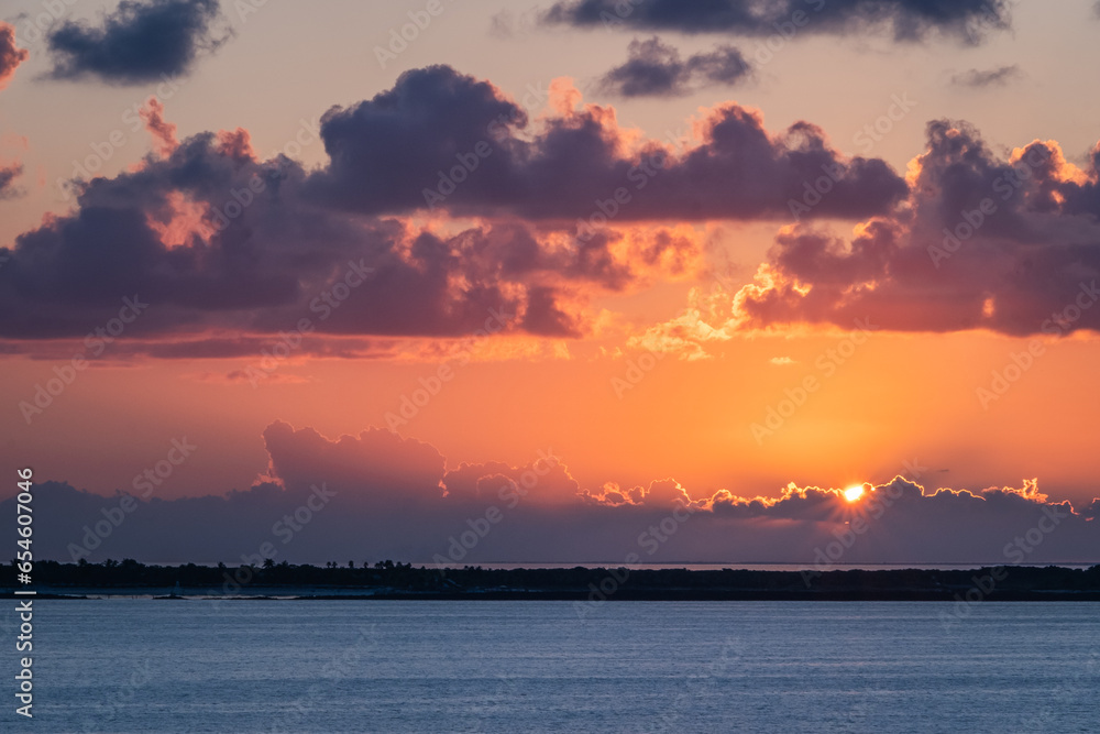 Sunrise and sunset over the horizon of the Caribbean Sea, the Bahamas, the North Atlantic Ocean,