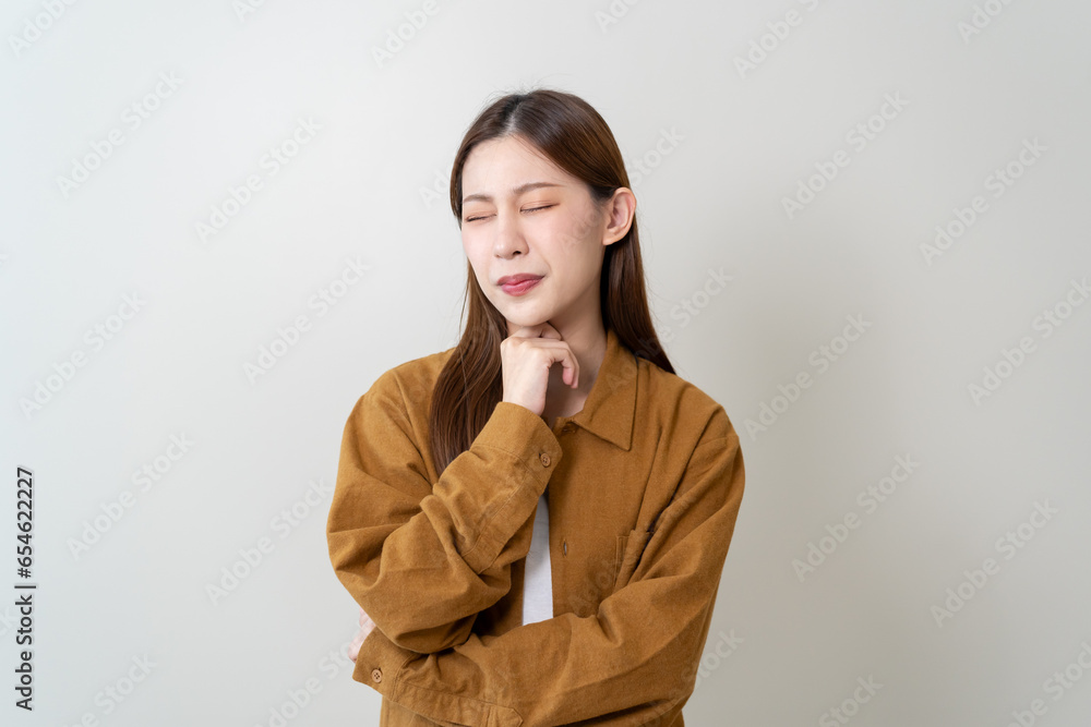 Woman touching at her neck and feeling hurt in her throat from influenza virus. Woman touching at her neck and feeling hurt in her throat from influenza virus.