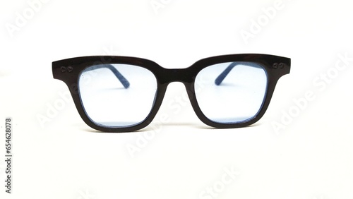 blue lensed sun glasses on a white background