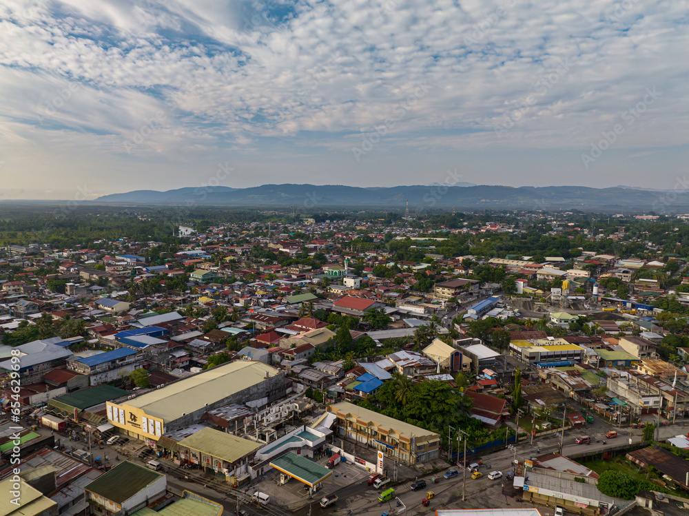 Residential buildings in Cotabato City. Skyline. Blue sky with clouds. Mindanao, Philippines.
