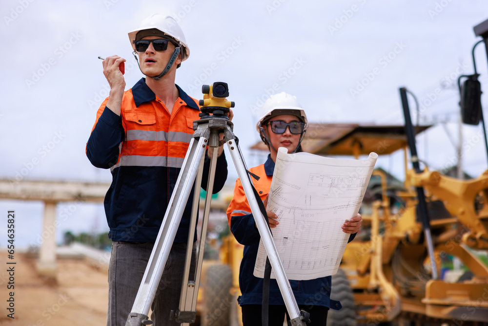 Engineer use theodolite equipment for route surveying to build a bridge Engineer use theodolite equipment for route surveying to build a bridge