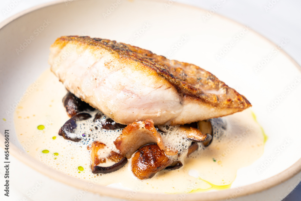 grilled Barramundi steak with mushroom sauce grilled Barramundi steak with mushroom sauce
